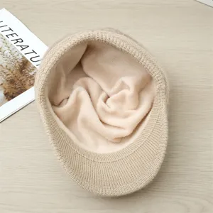 Detailed interior view of the warm knitted fleece-lined duckbill hat showing soft texture.