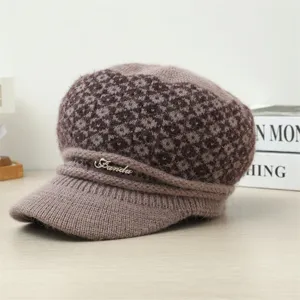 Winter warm knitted newsboy hat for women with plush texture and metal detail view