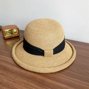 French style straw sun hat for women summer rolled brim beach hat with elegant black bow.