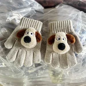 Winter children knit gloves featuring cute cartoon puppy design, warm five finger mittens for kids.