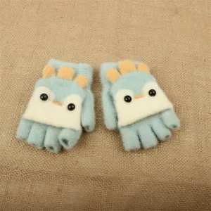 Close-up details of cute children half-finger flip-top knit gloves with lovely cartoon design.