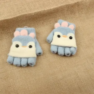 Cute cartoon penguin knit half-finger flip gloves detail view showing soft woolen texture.