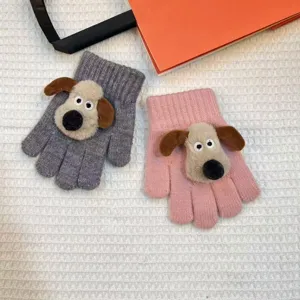 Detailed view of winter children knitted five finger gloves featuring cute 3D puppy plush decor.