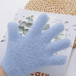 Kids winter warm blue knit gloves detail view, thick fleece thermal gloves for children.