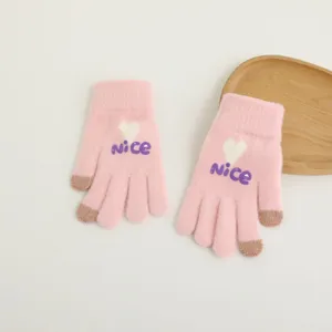 Women winter warm touch screen knit gloves detail view, pink heart pattern knit gloves