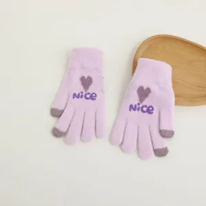 Detailed view of women's winter warm touch screen knit gloves in light purple with cute heart and text design.