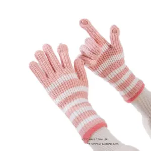 Women's pink striped knit gloves with finger openings for winter warmth, long cuffs.
