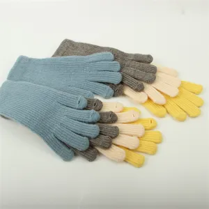 Detailed view of warm winter knitted touchscreen gloves in multiple colors for women daily wear.