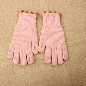 Pink knit fingerless gloves detail, cute green and orange cuff, winter warm wool material.