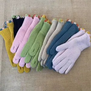 Cute knit winter gloves with exposed fingers, colorful tips, warm wool blend, soft touch.