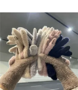 Close-up detail of cozy plush knitted winter gloves featuring soft touch and multi-color.