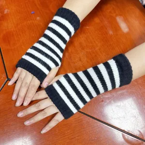 Black and white striped knitted fingerless gloves arm warmers for cozy winter warmth