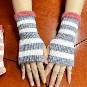 Knit fingerless gloves detailed view, striped arm warmers design, cozy autumn winter wear.