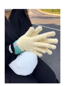 Warm winter knitted gloves for women with cozy plush lining, thick split-finger thermal design.