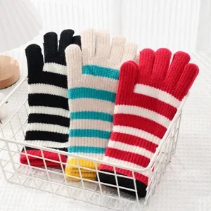Cozy striped knitted winter gloves with long cuffs, warm and stylish for women daily wear.