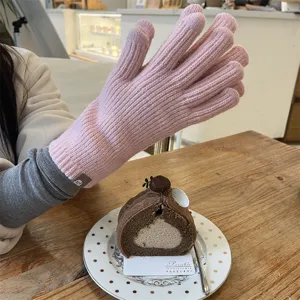 Solid color winter warm knitted women gloves, fingerless long design, cozy and stylish.
