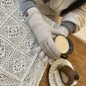 Winter long knit fingerless gloves in solid beige, featuring cozy wool and cute bear cuff detail.