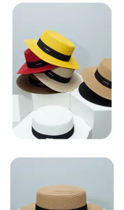 Detailed view of colorful straw jazz hats with black ribbons, perfect for outdoor summer styling.