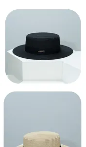 Detailed view of hand-woven straw boater hat in black and beige, perfect for summer sun.