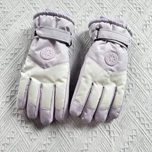Detailed view of women winter ski gloves, thick fleece warm waterproof touch screen design.