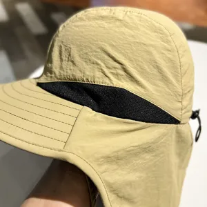 Outdoor sun protection hat detail, wide brim and neck flap for men hiking fishing.