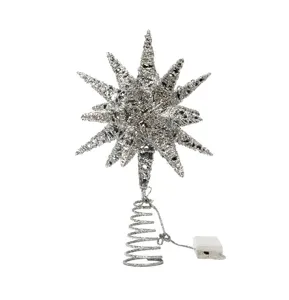 Detail view of silver glittery LED Christmas tree star topper with a battery pack