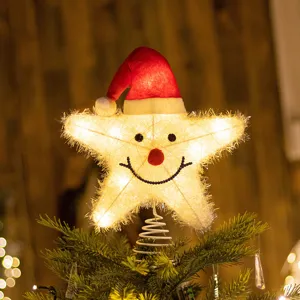 Glowing LED star tree topper with cute Santa hat and smiling face for Christmas