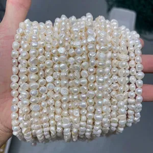 Close-up detail of natural white freshwater Baroque pearls showing unique surface luster