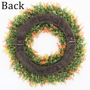 Detailed back view of a simulated boxwood and eucalyptus leaf wreath for home door decoration