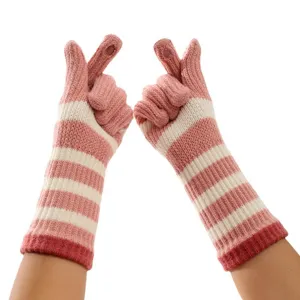 Women winter striped knit fingerless gloves long warm arm warmers pink and white main view