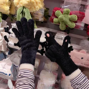 Cozy winter fleece knit gloves with half-finger design for touchscreen use and warmth.