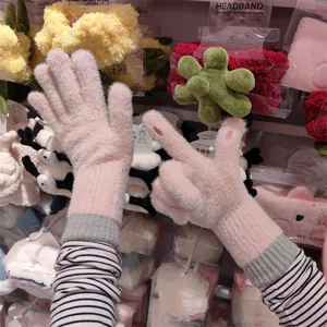 Pink fluffy touchscreen split-finger winter warm gloves with cozy ribbed knit cuffs for daily wear.