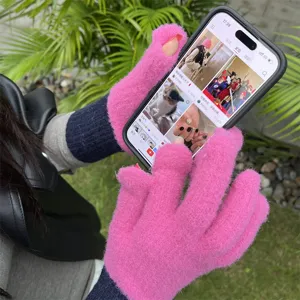 Winter warm pink knitted fingerless gloves with dark blue extended cuffs for women and students.