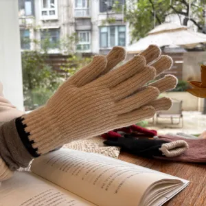 Minimalist knit wool gloves detail shot, warm winter touch screen gloves, versatile beige style.
