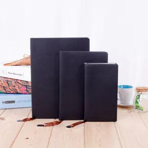 Business black leather notebook set with ribbon bookmark, ideal for office and daily journaling.