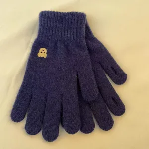 Dark blue knit gloves featuring cute bear embroidery, warm winter design daily use.