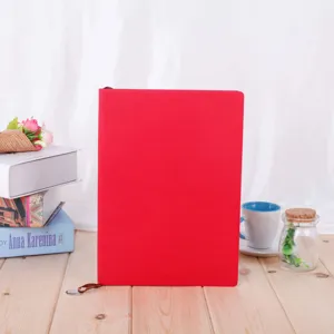A5 red leather notebook detail view, professional business journal for office and daily writing use.