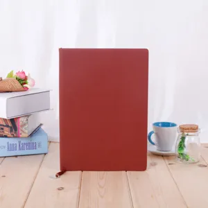Red hardcover A5 notebook detail, faux leather business journal, professional planner styling view