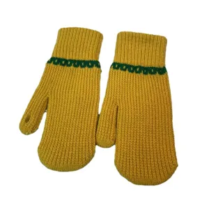 Knitted winter warm yellow mittens with green pattern cozy cute fashion cold weather gloves