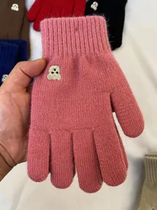Cozy winter knit gloves for women, cute bear embroidery, touchscreen design, pink.