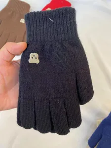 Winter warm knit gloves featuring cute bear embroidery split finger design for wear