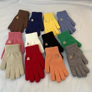 Winter warm knitted gloves with cute bear embroidery, solid color touchscreen full-finger design.