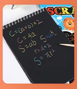 Detail view of creative colorful DIY scratch art notebook with formulas and stylus