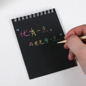 Children DIY rainbow scratch art notebook with wooden stylus for creative drawing and graffiti.