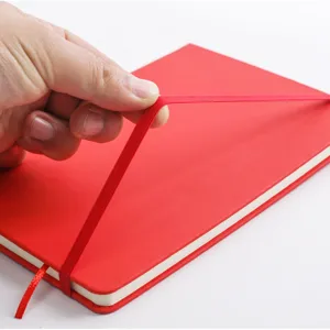 A5 red hardcover business notebook with elastic closure band and ribbon bookmark for daily office use.