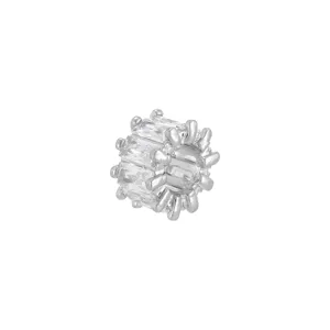 Detailed view of a silver-tone spacer bead with baguette-cut cubic zirconia stones