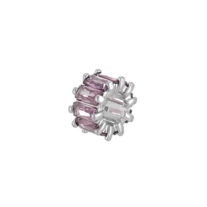 Detailed macro shot of a purple baguette zirconia spacer bead for DIY jewelry making.