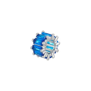 Close-up of silver-plated spacer bead with blue baguette-cut cubic zirconia