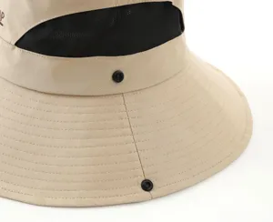 Khaki outdoor sun hat detail view featuring breathable mesh panels and snap buttons