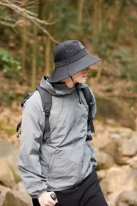 Outdoor sun hat detail view featuring breathable mesh panels, wide brim, and comfortable fit.